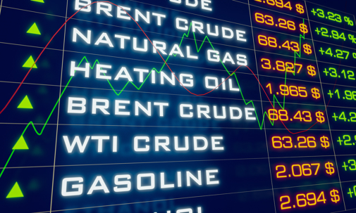 Energy futures price board showing Brent Crude, WTI Crude, Natural Gas and Heating Oil with live price movements, illustrating the oil futures market at the center of the CFTC insider trading investigation