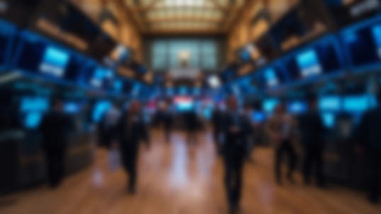 Blurred figures on a trading floor surrounded by screens, illustrating the difficulty of identifying insiders in prediction markets